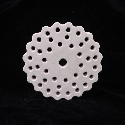 Thermal conductivity 3.5 to 4.5 watts per meter Kelvin Mullite ceramic with thermal expansion coefficient 4.5 to 5.5 times 10 to the minus 6 per Kelvin and porosity below 15 percent